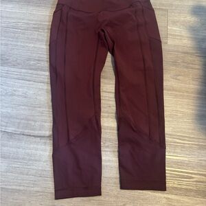 Like new burgundy Lululemon leggings with pockets size 10